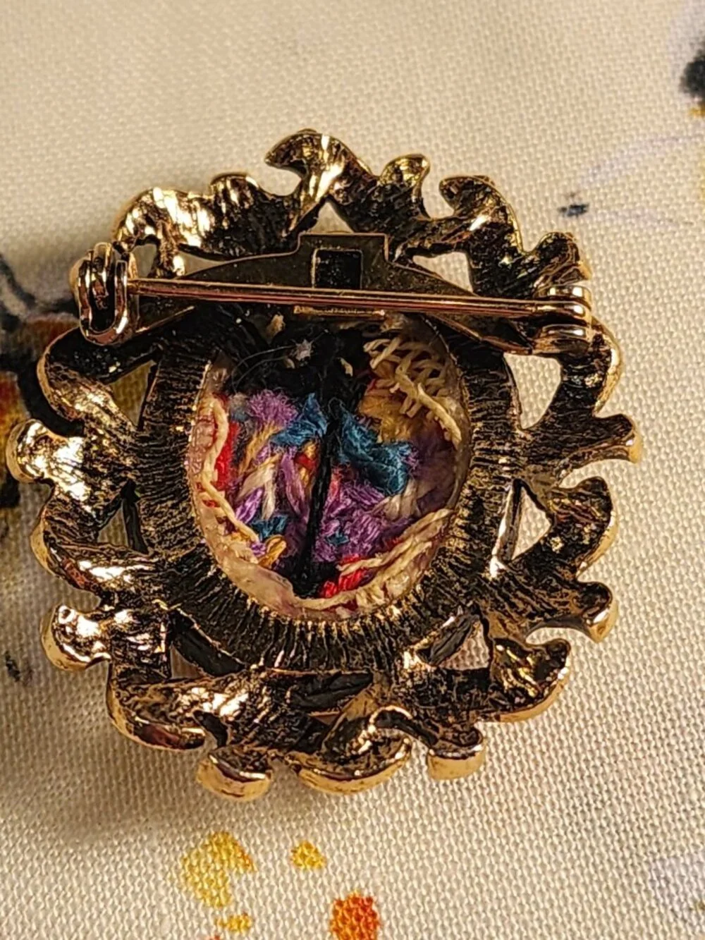 VINTAGE Brooch Featuring Colorful Embroidered Butterfly Set in Gold-Tone Wreath